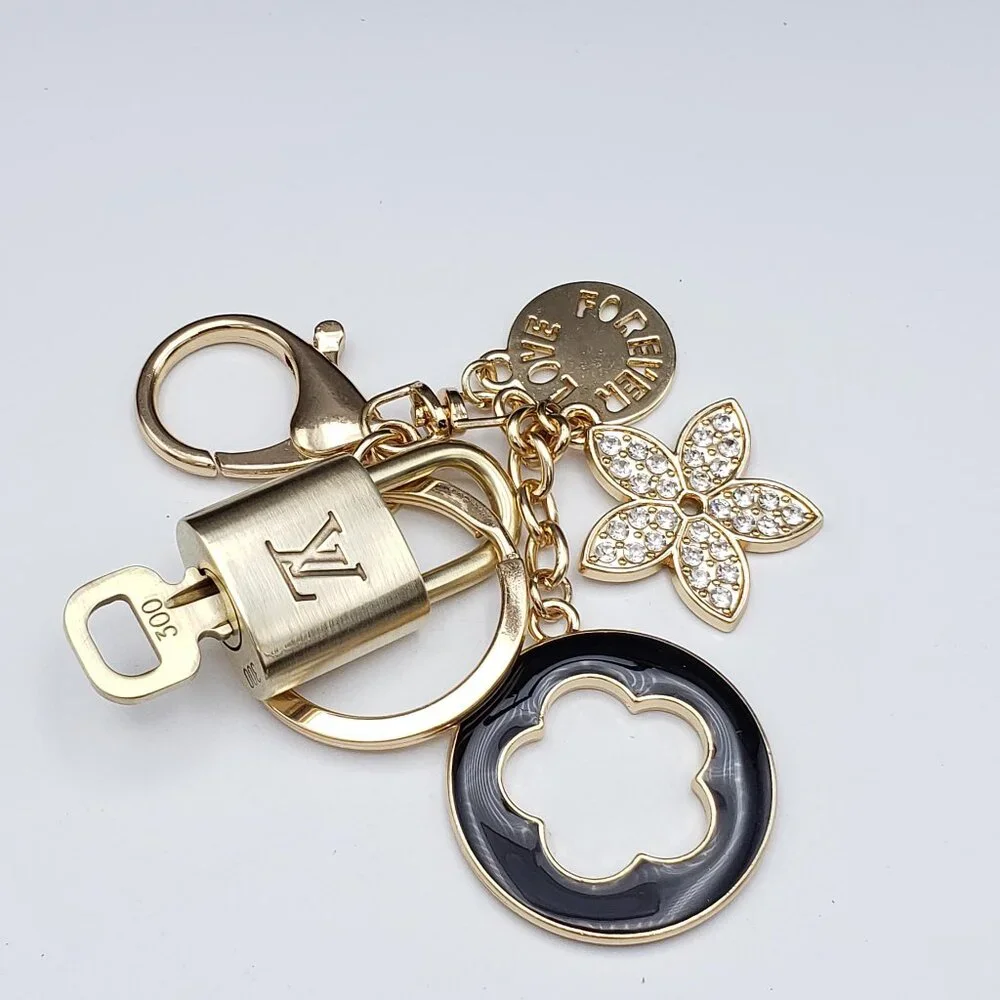 Authentic Louis Vuitton Lock & Key with Unbranded Flower Charm, Keychain
